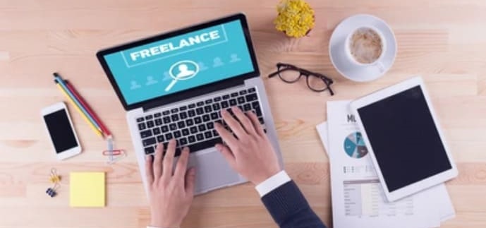 10 Legitimate Work From Home Jobs That Are Not Scams 2 Freelance writer working on laptop